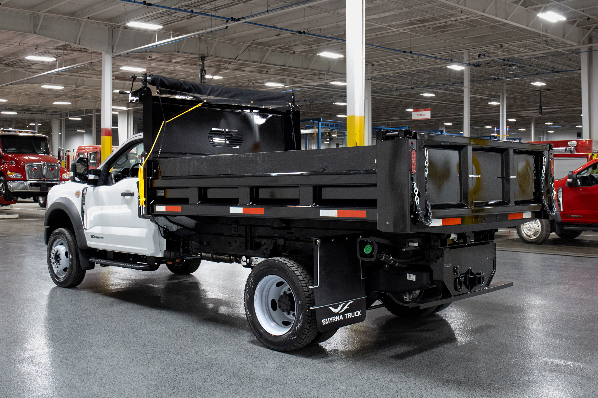Smyrna Truck & Rugby Eliminator Carbon Steel Dump Body on Ford F-550 Chassis