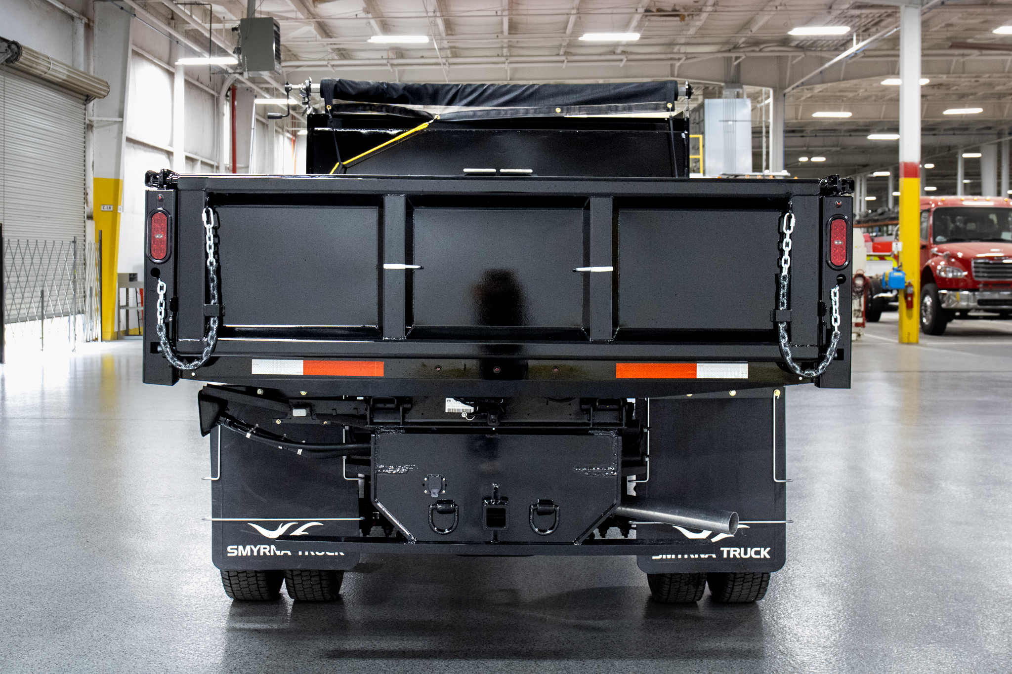 Smyrna Truck & Rugby Eliminator Carbon Steel Dump Body on Ford F-550 Chassis