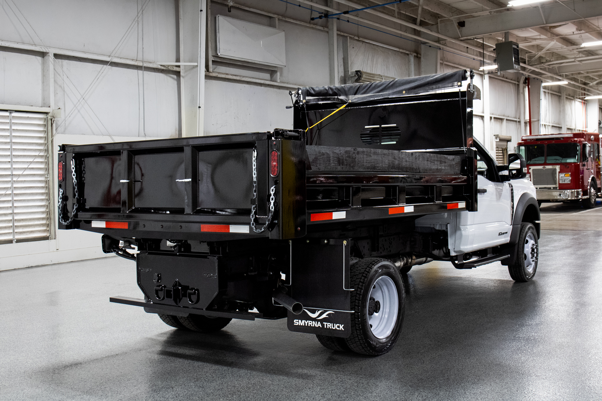 Smyrna Truck & Rugby Eliminator Carbon Steel Dump Body on Ford F-550 Chassis