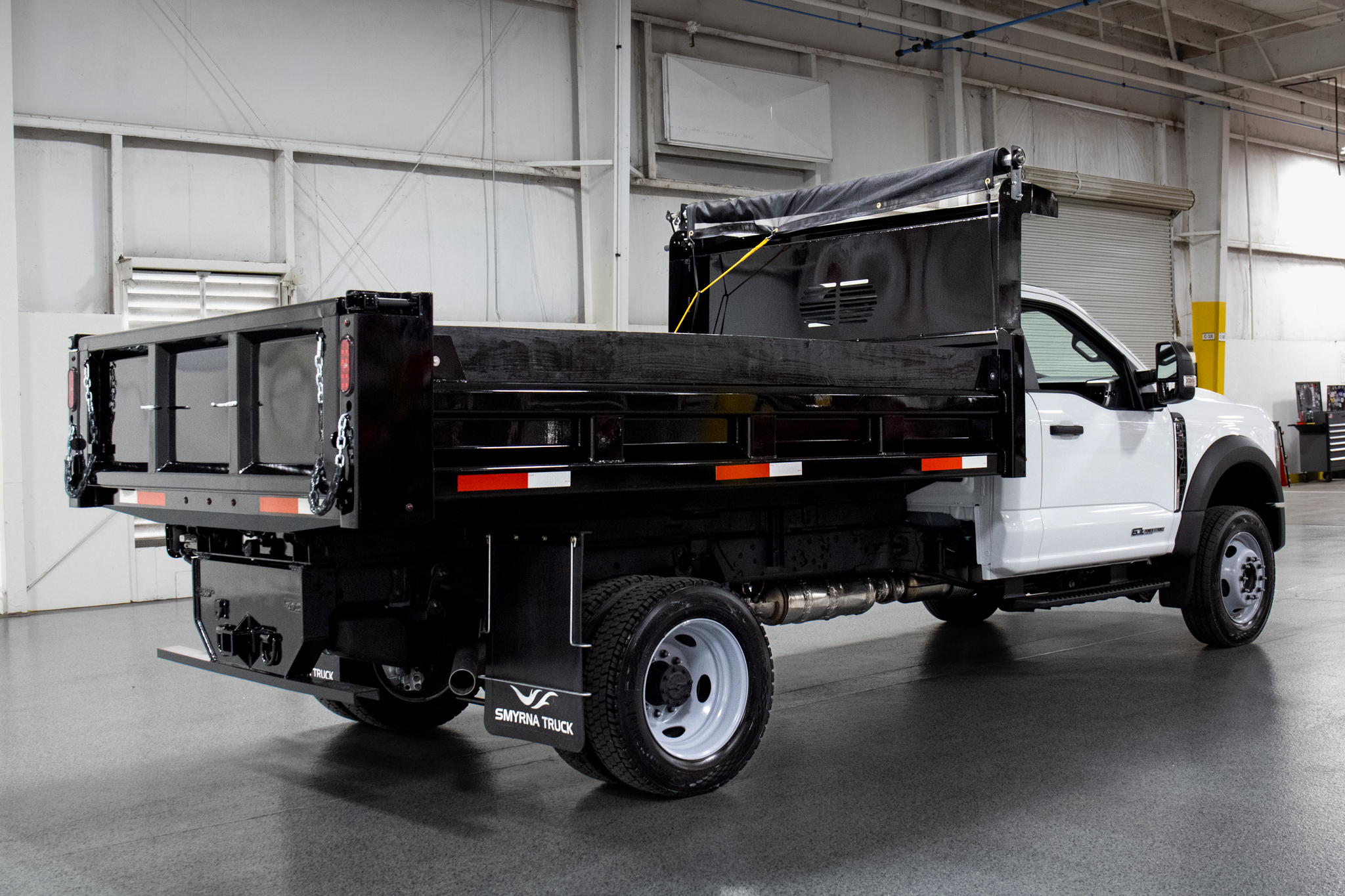 Smyrna Truck & Rugby Eliminator Carbon Steel Dump Body on Ford F-550 Chassis