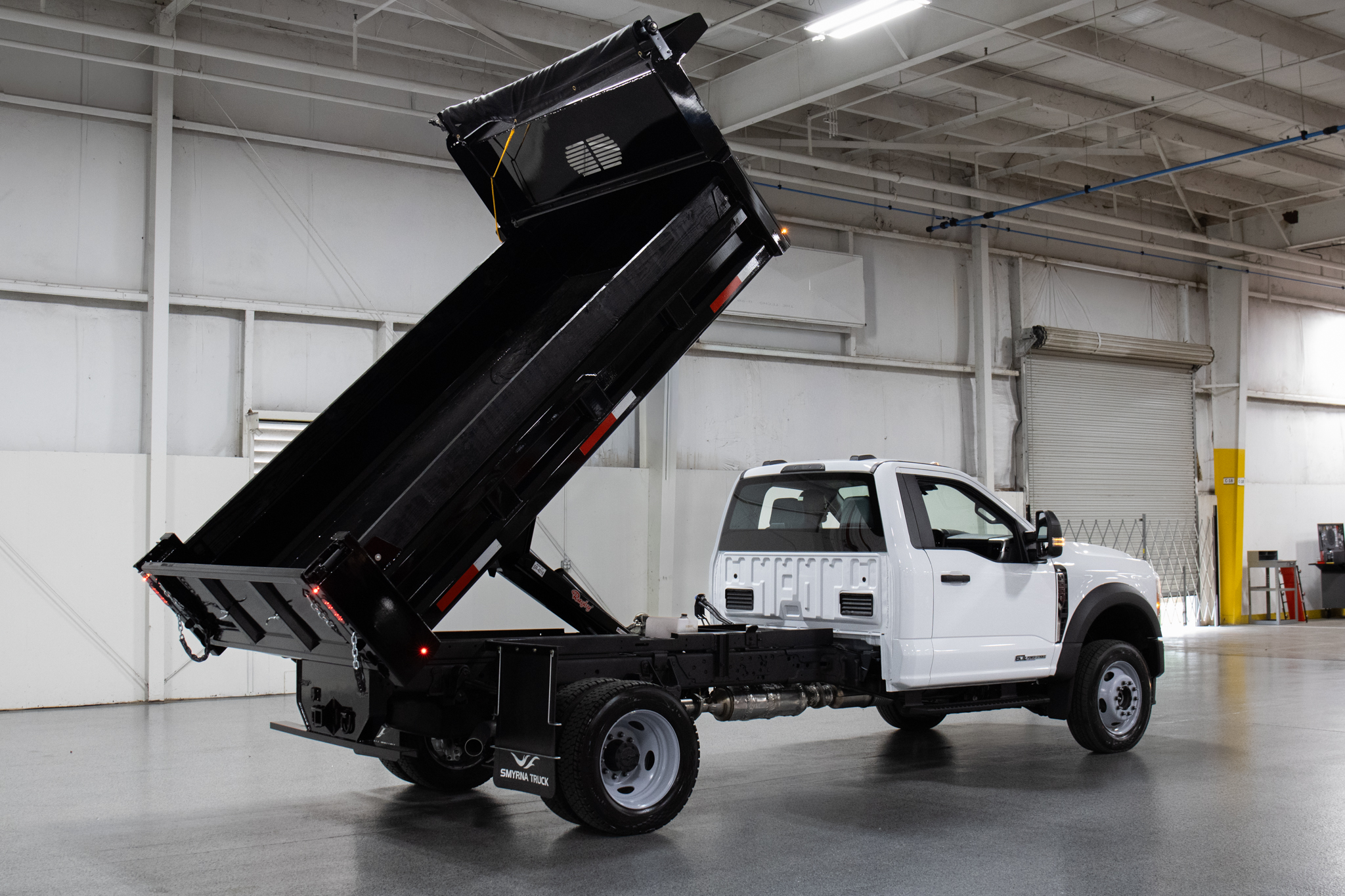 Smyrna Truck & Rugby Eliminator Carbon Steel Dump Body on Ford F-550 Chassis