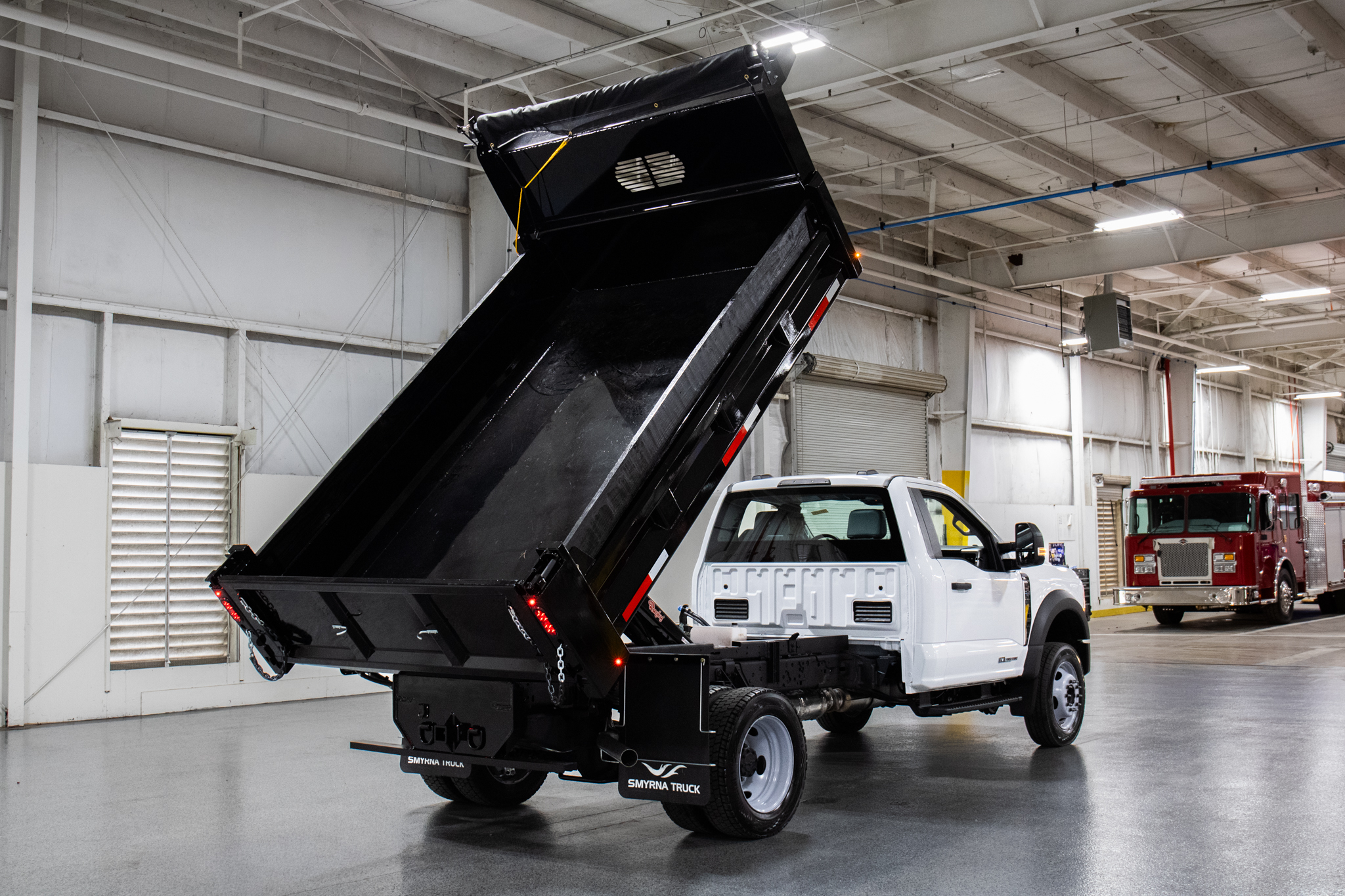 Smyrna Truck & Rugby Eliminator Carbon Steel Dump Body on Ford F-550 Chassis