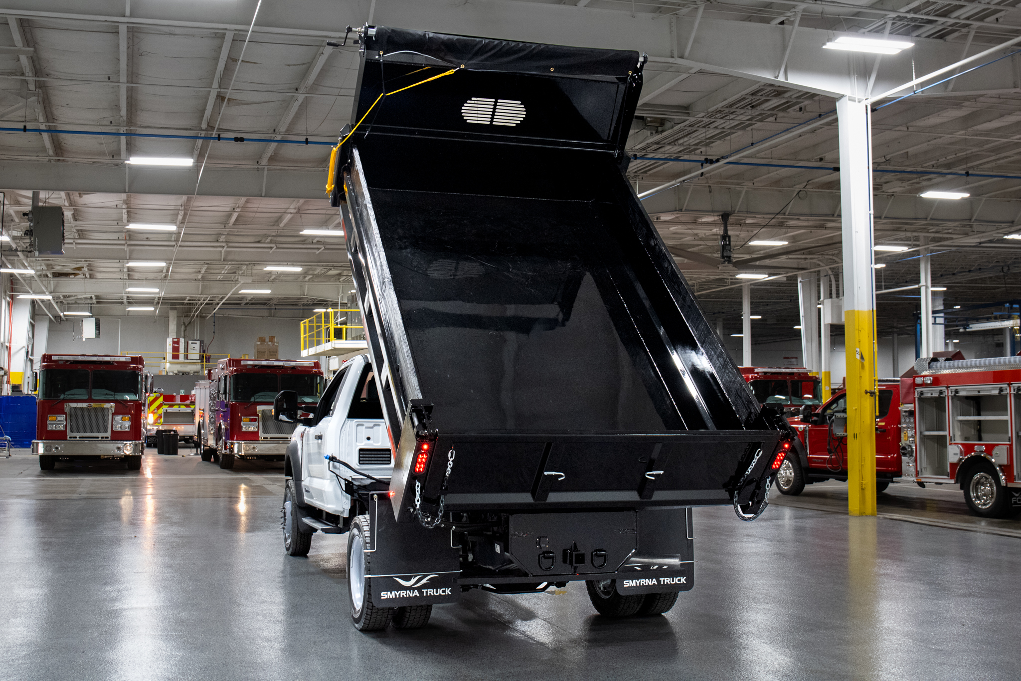 Smyrna Truck & Rugby Eliminator Carbon Steel Dump Body on Ford F-550 Chassis
