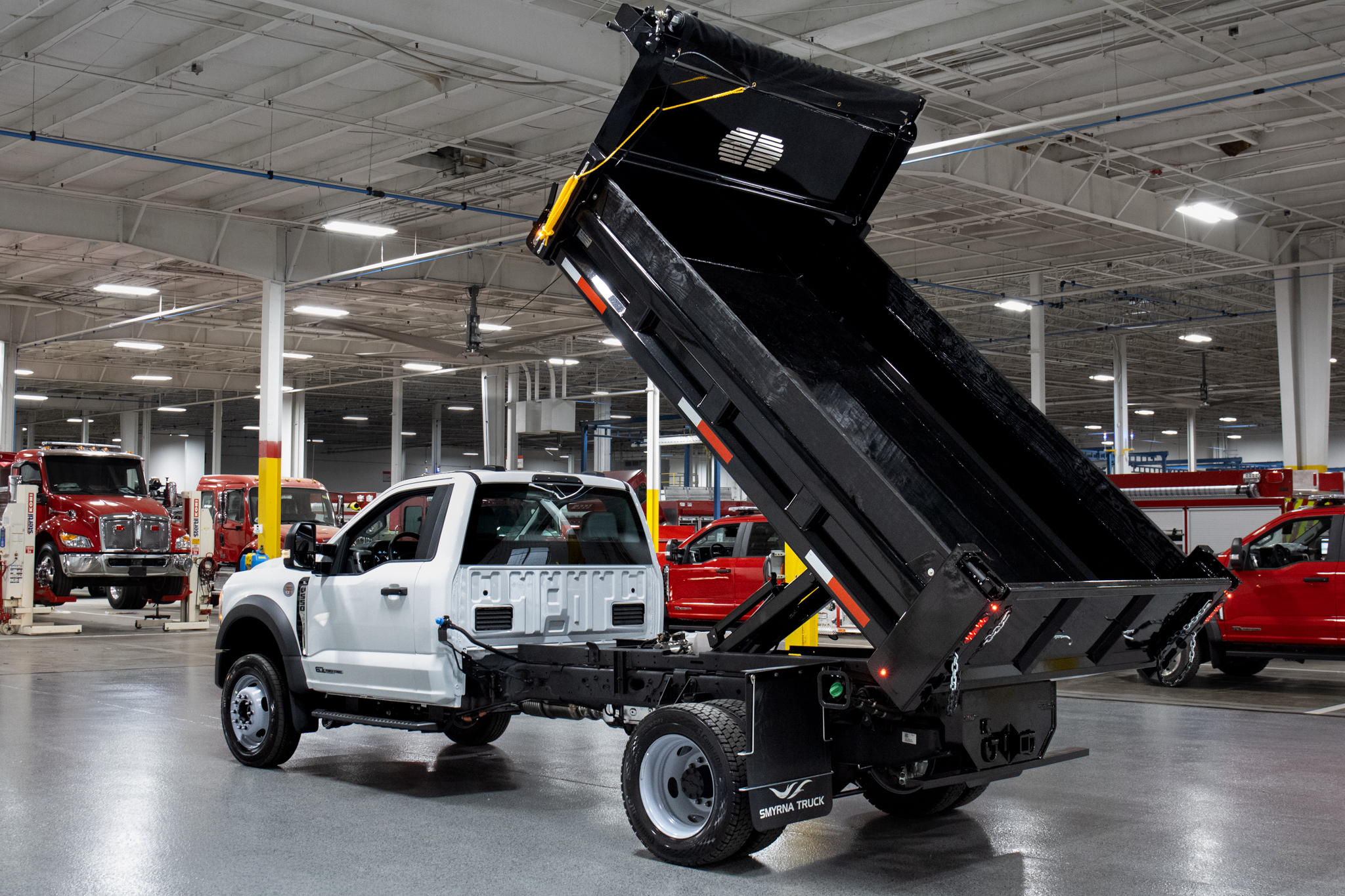 Smyrna Truck & Rugby Eliminator Carbon Steel Dump Body on Ford F-550 Chassis